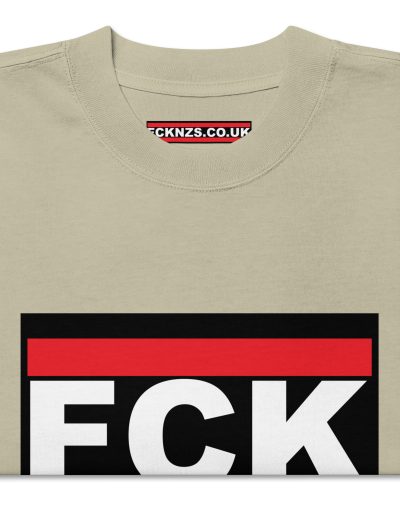 Make a bold statement with the FCK NZS Fuck Nazis Oversized Faded T-shirt. Printed with the vibrant and durable DTF (direct to film) technique, this shirt features a striking design to show your stance against fascism. Made from 100% carded cotton, it offers a boxy, oversized fit for ultimate comfort and style. Wear it proudly to raise awareness and stand up for what’s right.