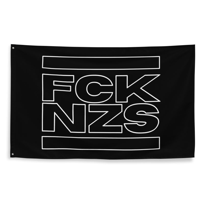 The FCK NZS Outline Flag is a bold statement piece for any space. Made from 100% durable polyester, this flag features two sturdy iron grommets for easy hanging. The minimalist FCK NZS outline design stands out, delivering a powerful anti-fascist message. Perfect for indoor or outdoor display, this flag is built to withstand the elements while showing your support for the cause. Whether at home, at rallies, or at events, make your stance clear with this eye-catching flag.